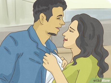 Put your arms around his waist and pull him close.